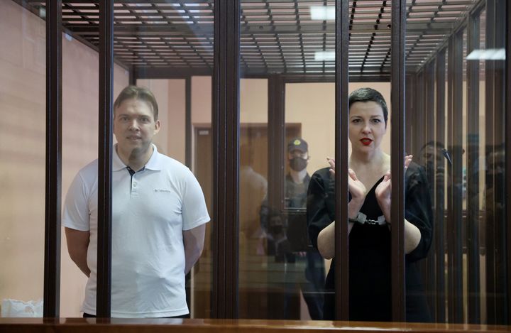 Belarusian opposition activists Maxim Znak, left, and Maria Kolesnikova appear for a sentencing hearing at the Minsk Region Court on Sept. 6, 2021.