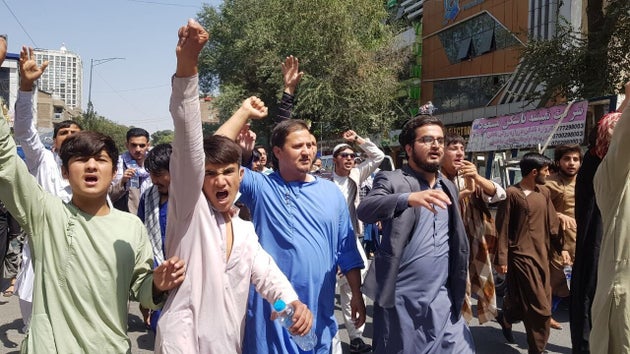 A group of Afghans stage a protest against Pakistan on Tuesday, September