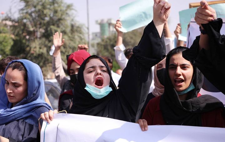 Women shouting in Kabul before the Taliban suppressed the protest