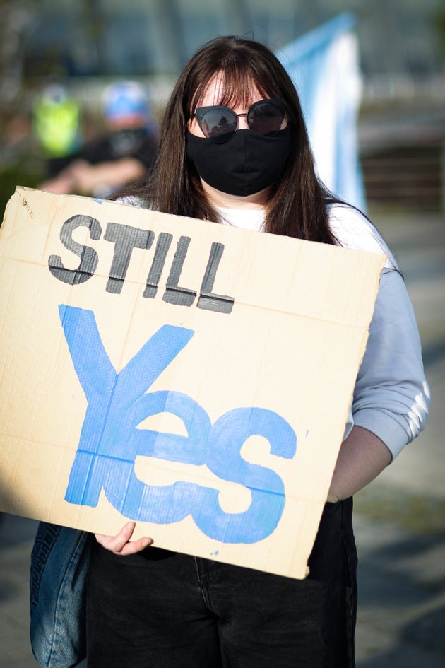 A member of the public during an IndyRef2 rally outside the headquarters of BBC Scotland last