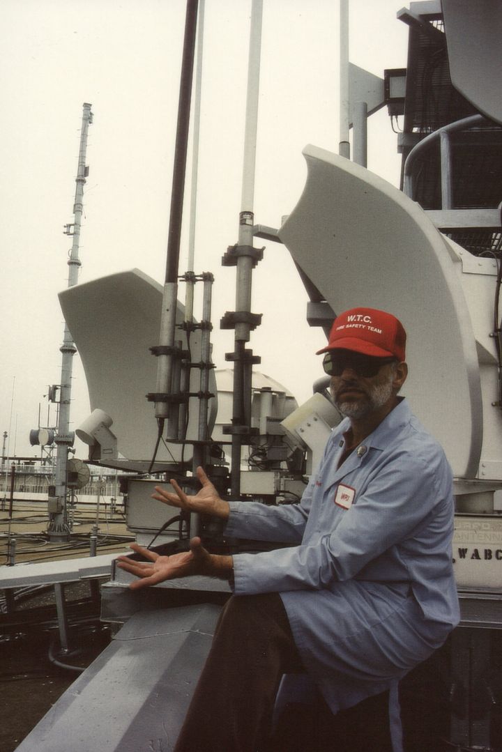 Steven Jacobson perched on the roof of One World Trade Center, pointing out the repeater transmitters, circa 1981.