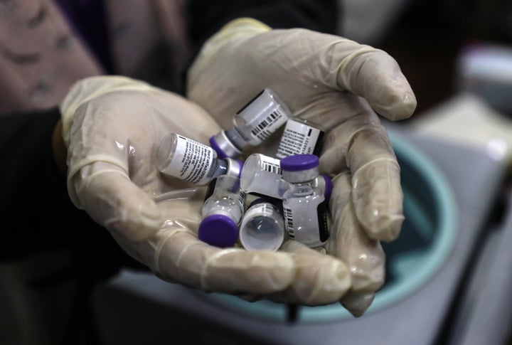 Palestinian medical workers prepare for a vaccination campaign at Hassan Al - Harazin School in Gaza City, September 1, 2021.