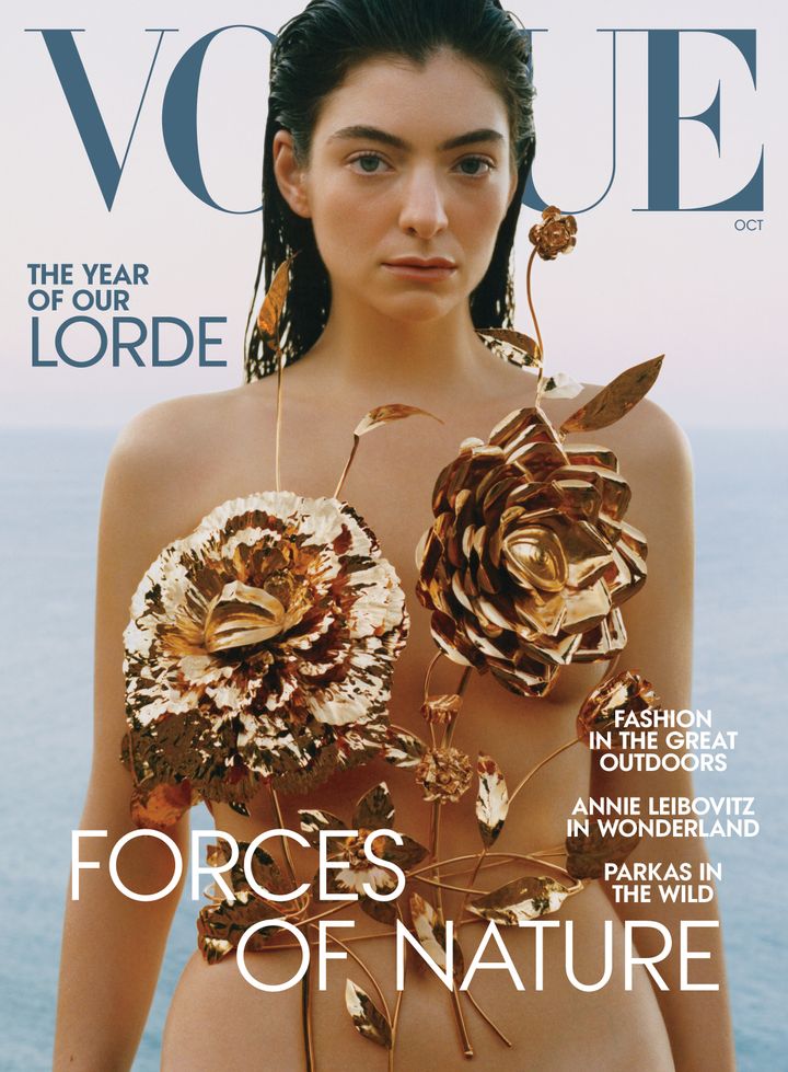 Lorde wears a Schiaparelli top on the cover of Vogue's October issue.