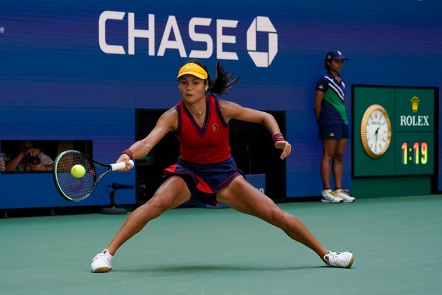 Emma Raducanu returns a shot to Belinda