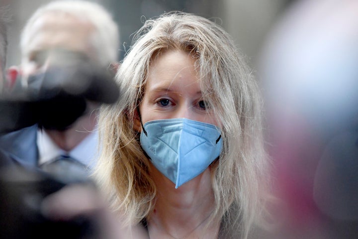 Elizabeth Holmes, founder and CEO of Theranos, arrives at the federal courthouse for jury selection in her trial, Tuesday, Aug. 31, 2021, in San Jose, Calif. (AP Photo/Nic Coury)