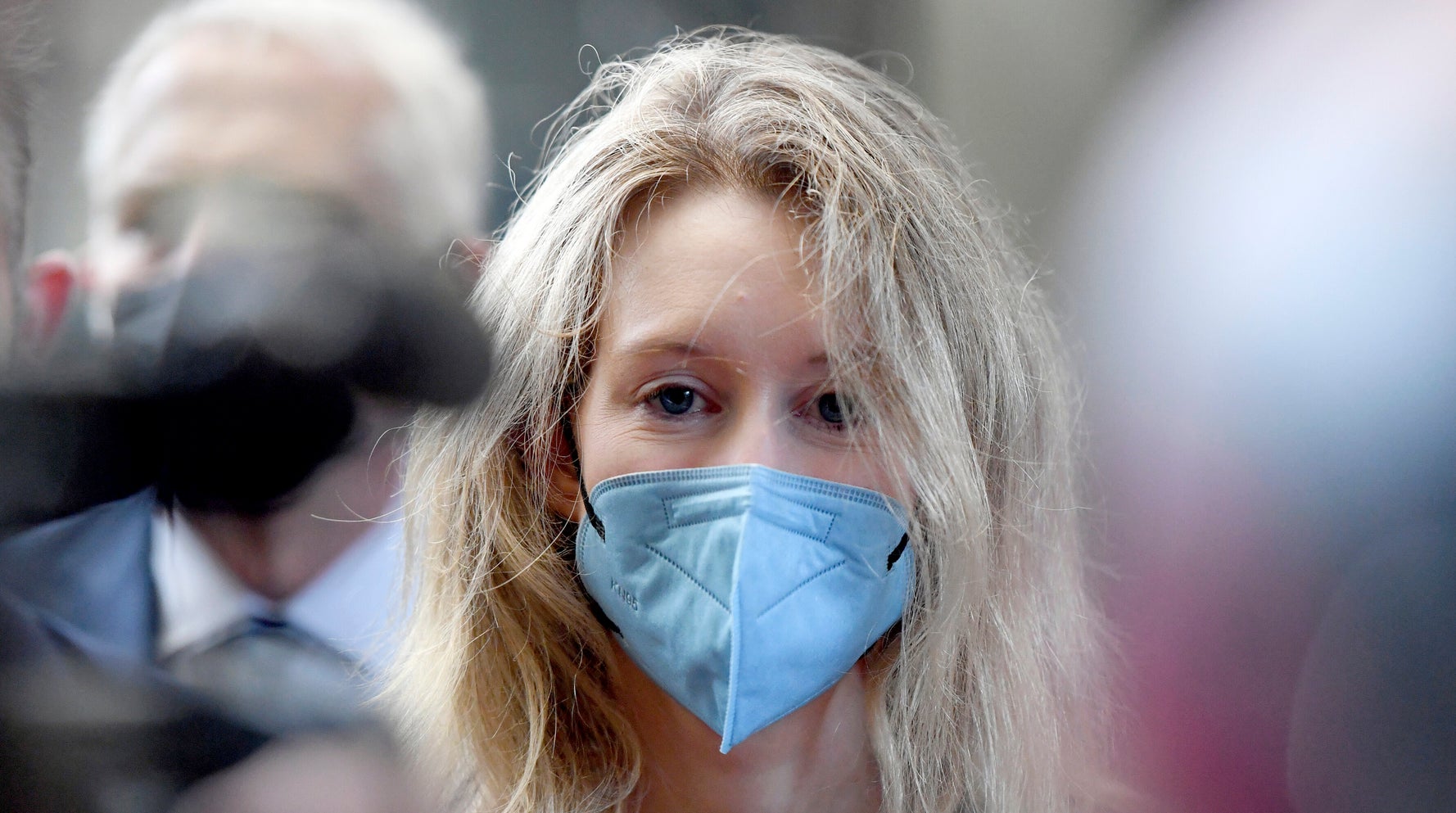 Elizabeth Holmes Drawn As Villain, Underdog As Trial Begins