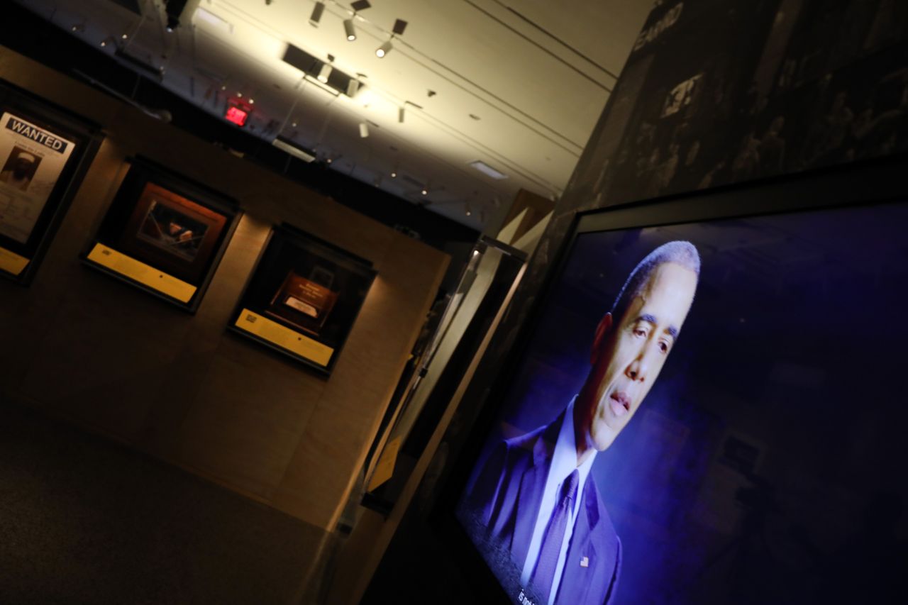 A video of former president Barack Obama shows on a monitor at the exhibition "Revealed: The Hunt for Bin Laden" at the 9/11 Memorial Museum on Nov. 7, 2019, in New York City.