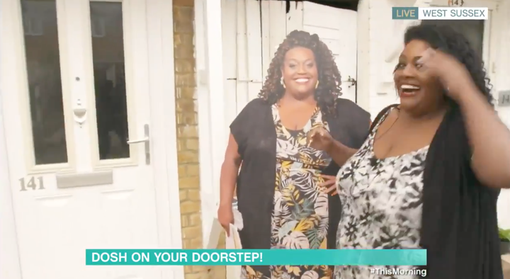 Alison Hammond waits outside