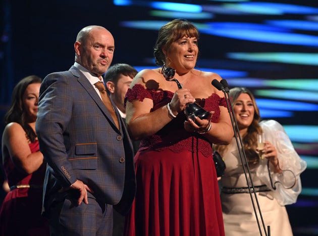 Julie Malone accepts Gogglebox's award at the