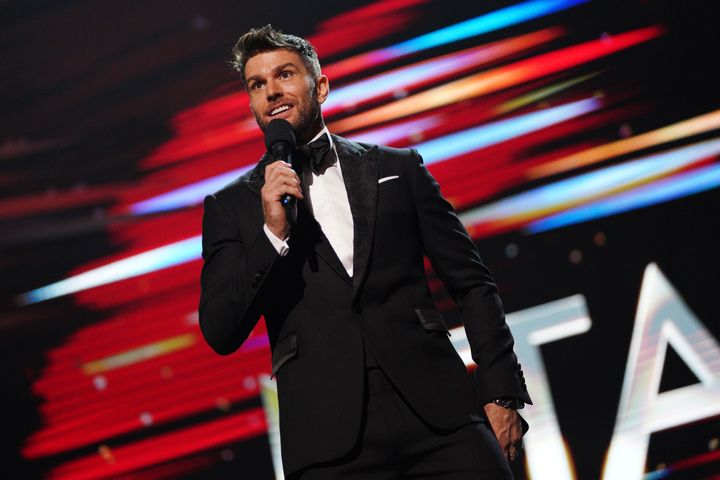 Joel Dommett on stage at the 2021 NTAs