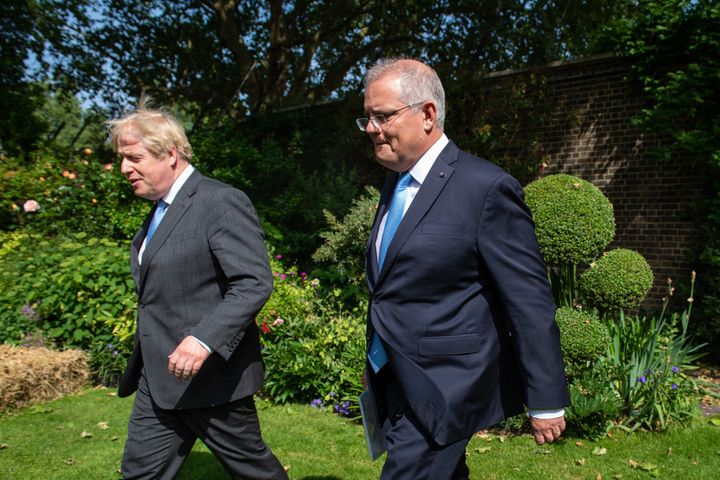 Boris Johnson and Scott Morrison in June drafting up a free trade deal