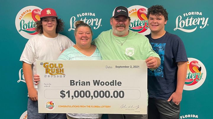 Brian Woodle, 46, won $1 million in a lottery game the same day he and his wife opened an auto repair shop.