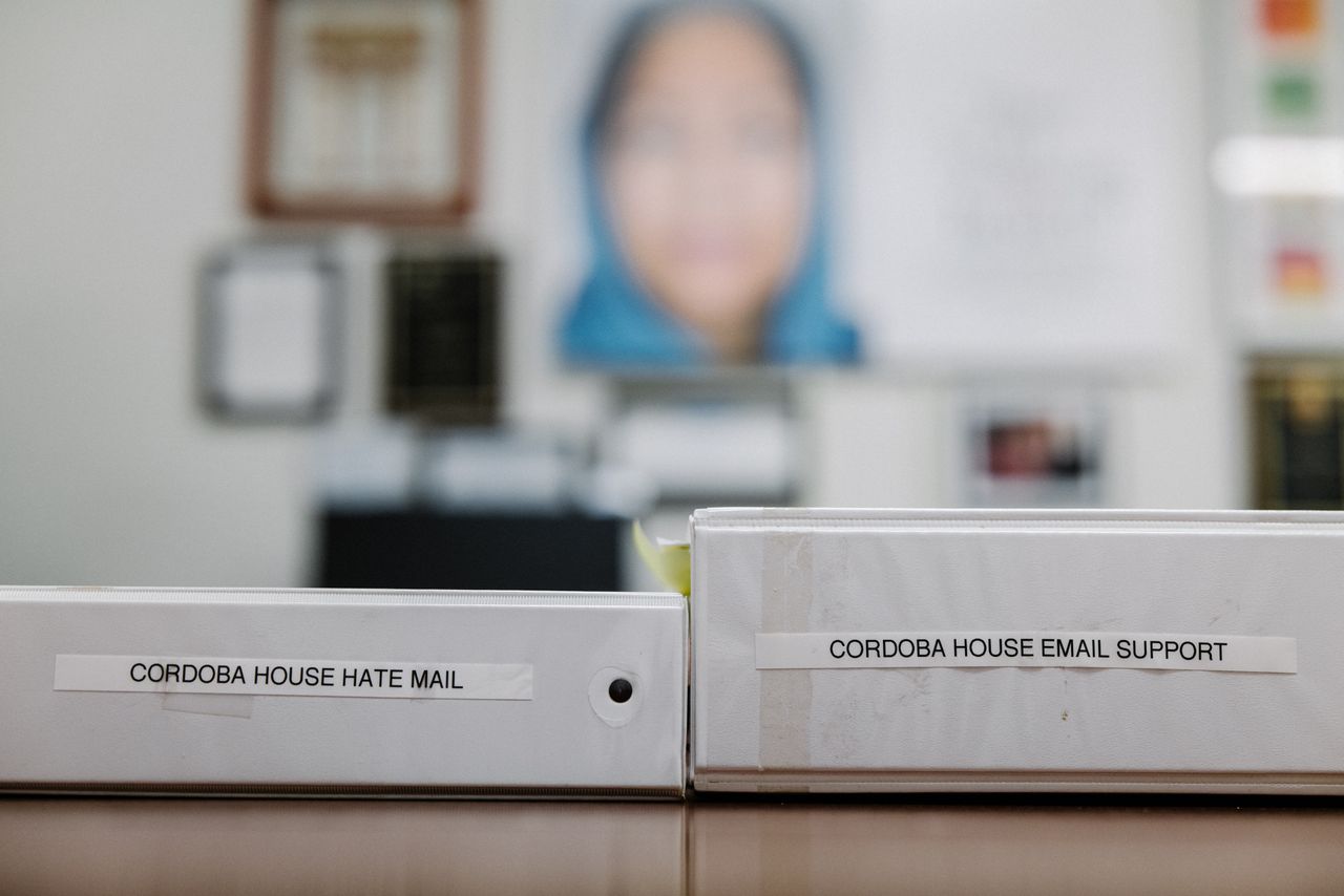Binders of both hate mail and support letters in Daisy Khan's office.
