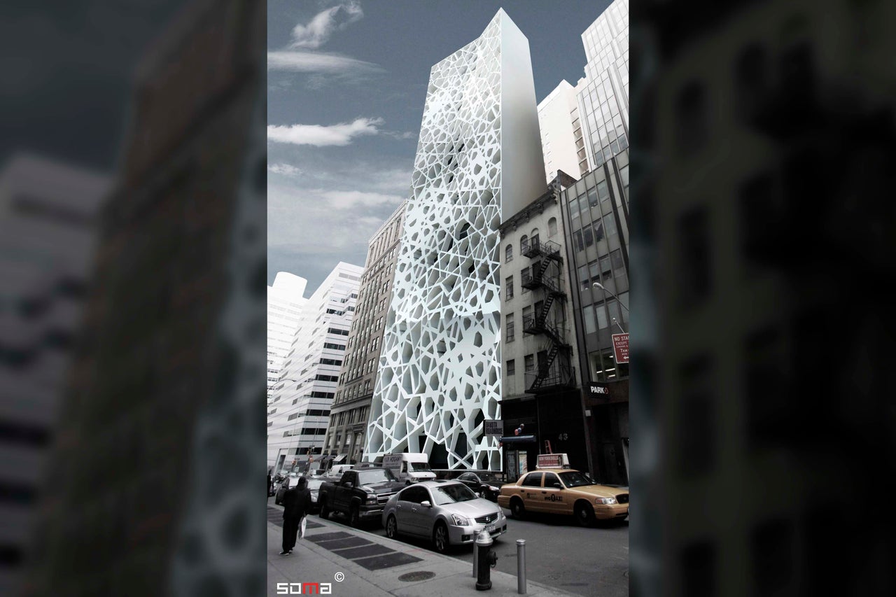 An artistic rendering provided by SOMA Architects on Oct. 1, 2010, shows an exterior view of the proposed Islamic community center and mosque with white walls and floors made up of a honeycomb of abstract shapes.