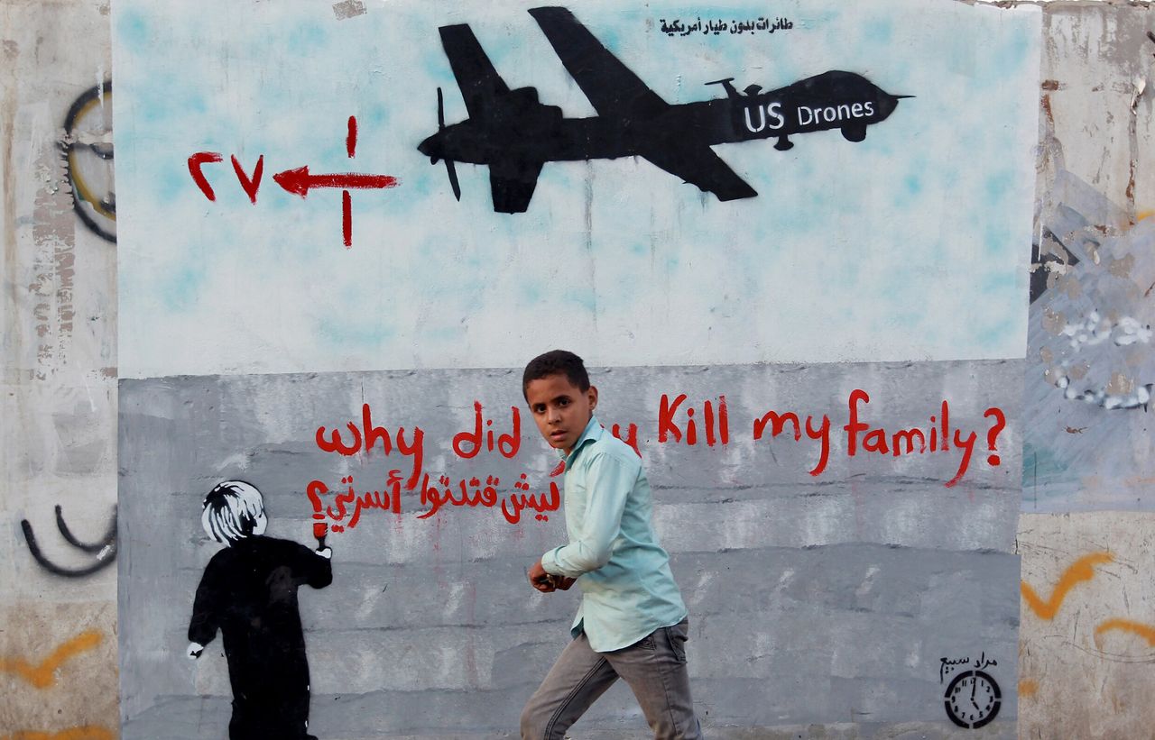A mural depicting a U.S. drone says, "Why did you kill my family?" in Sanaa, Yemen, on Dec. 13, 2013. A drone strike on a wedding convoy killed 17 people, mostly civilians, adding grist to the mounting criticism of U.S. drone attacks.