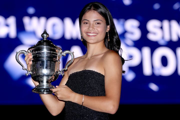 Emma Raducanu of Great Britain poses with the championship trophy after defeating Leylah Annie Fernandez of Canada during the