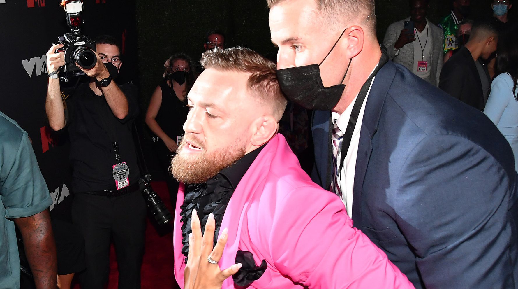 Conor McGregor Scuffles With Machine Gun Kelly On VMAs Red Carpet