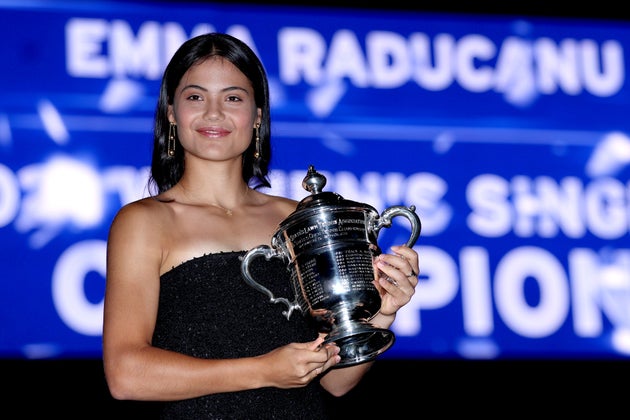 Emma Raducanu with the championship trophy after defeating Canadian Leylah Fernandez during their Women's...