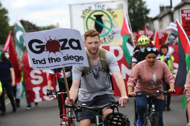 Pro-Palestine protesters march against the Defence and Security Equipment International (DSEI) fair on...