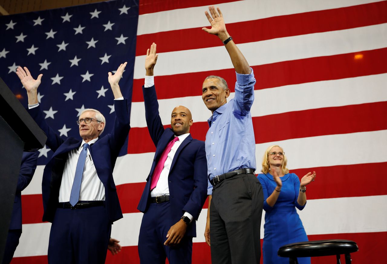Former President Barack Obama campaigns for Democrats Tony Evers (left) for governor, Mandela Barnes for lieutenant governor and Sarah Godlewski for state treasurer at a school in Milwaukee on Oct. 26, 2018. All three were successful.