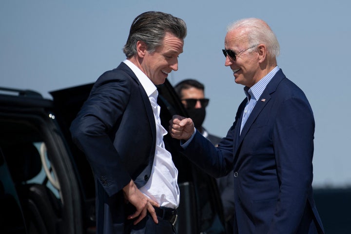 California Gov. Gavin Newsom (D) greets President Joe Biden on Monday. As part of an effort to drive up Democratic turnout, B