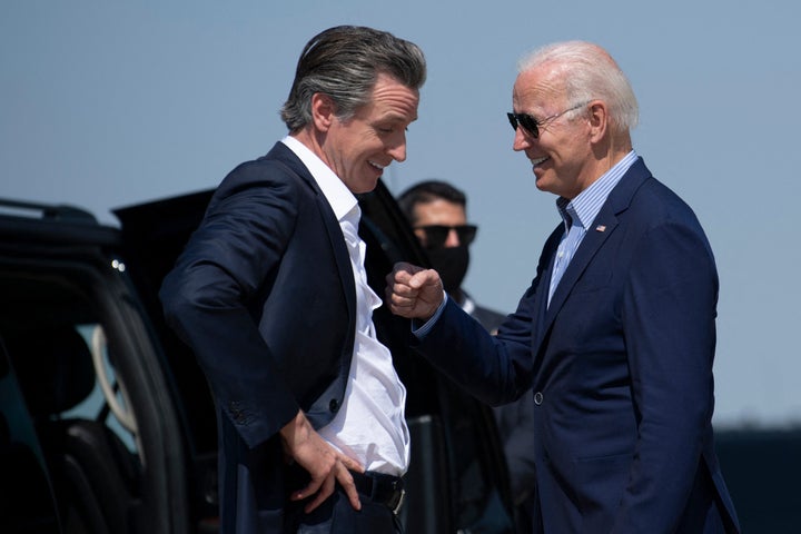 California Gov. Gavin Newsom (D) greets President Joe Biden on Monday. As part of an effort to drive up Democratic turnout, Biden was scheduled to hold a rally for Newsom in Long Beach.