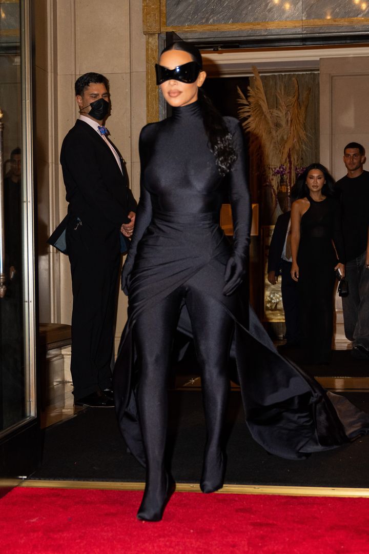 Kardashian's Met Gala after-party look revealed more of her face. 