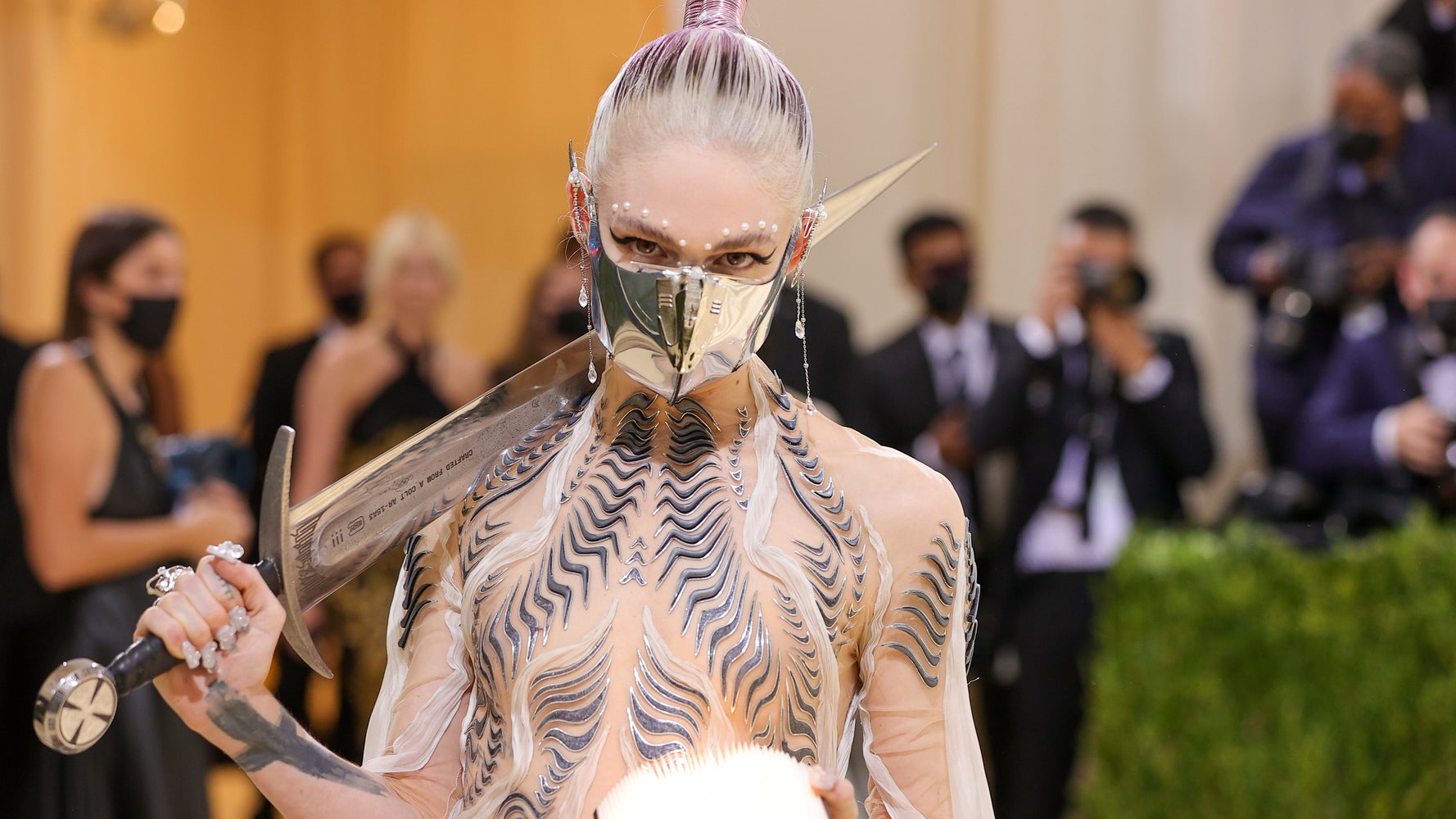 Grimes Brought A Sword To The Met Gala And It's Made From Something