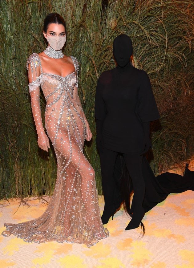 Kendall Jenner poses with Kardashian at the Met