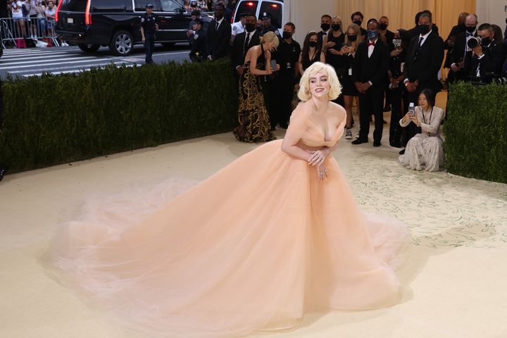 Billie Eilish, seen wearing an Oscar de la Renta gown at the 2021 Met Gala benefit "In America: A Lexicon of Fashion," will stop working with companies that traffic fur.