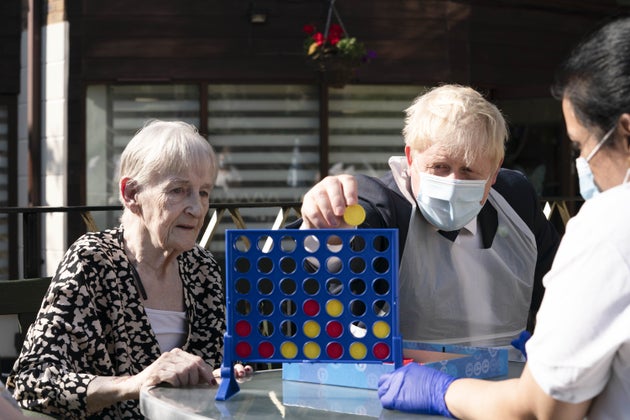 Boris Johnson during a visit to Westport Care Home in Stepney Green, east London, ahead of unveiling...