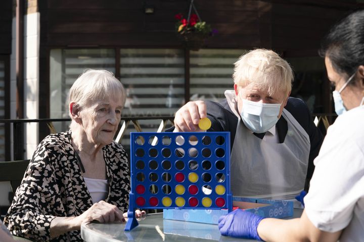 Boris Johnson during a visit to Westport Care Home in Stepney Green, east London, ahead of unveiling his long-awaited plan to fix the social care system.