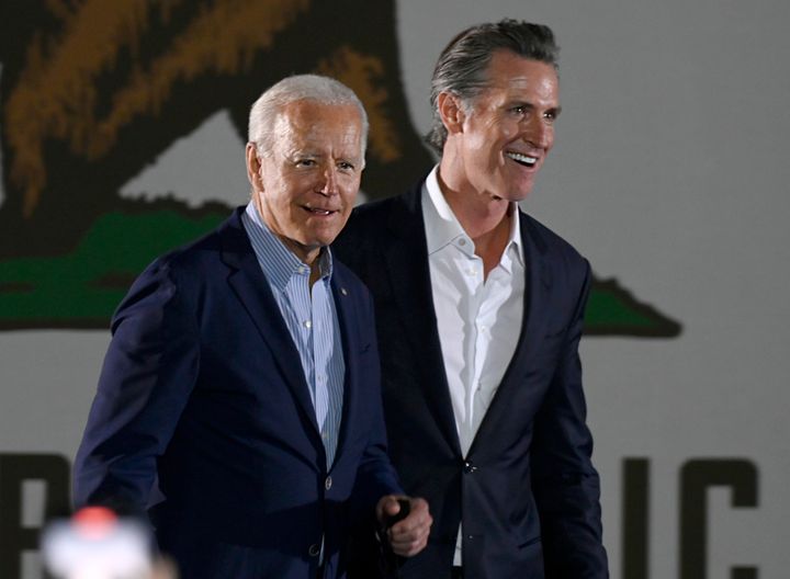 President Joe Biden and Governor Gavin Newsom enter the stage at Long Beach City College on the final day of campaigning against the recall in Long Beach on Monday, September 13, 2021.