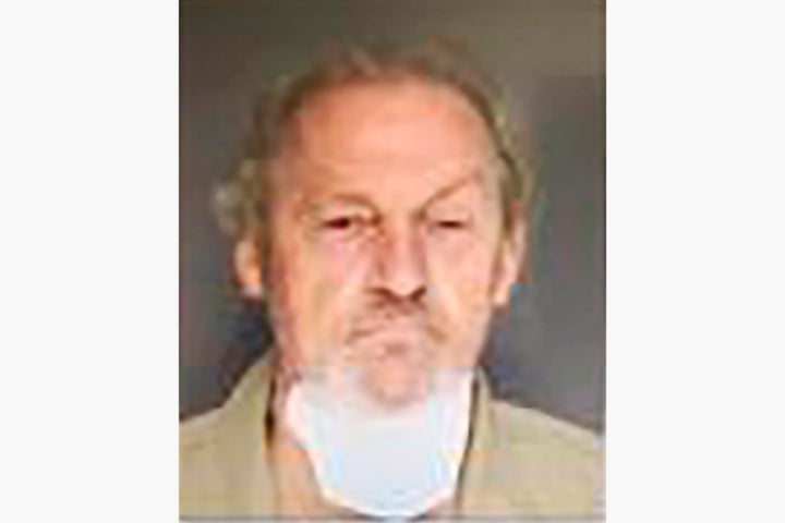 Curtis Edward Smith, seen Tuesday, was charged with assisted suicide, insurance fraud and several other counts in the Sept. 4