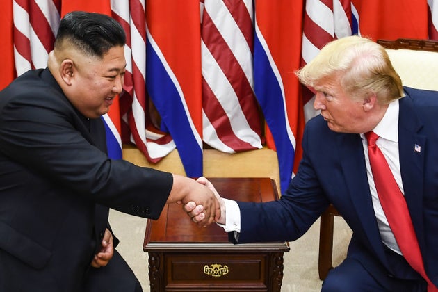 Kim Jong Un and US President Donald Trump shake hands in 2019 before discussing