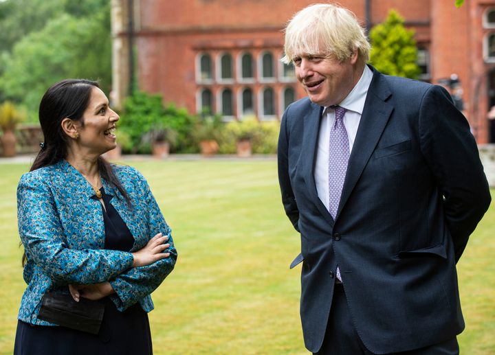 Prime minister Boris Johnson, with home secretary Priti Patel in July
