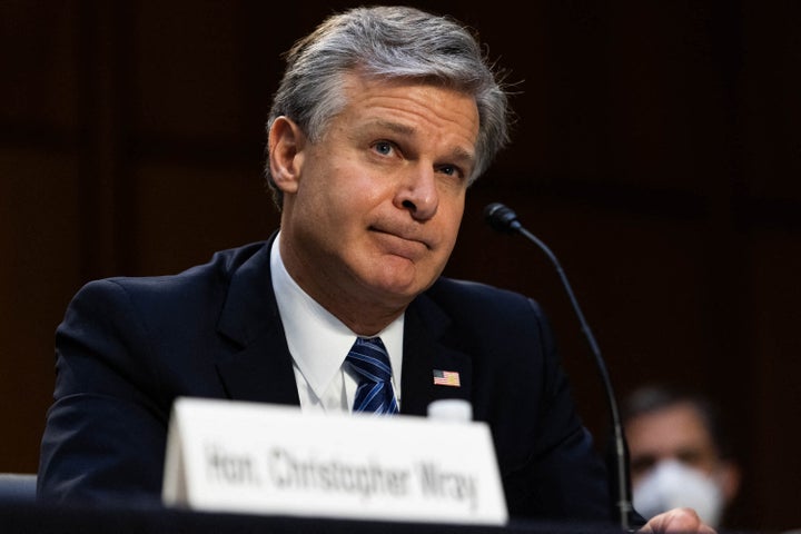 FBI Director Christopher Wray on Wednesday testifies during a hearing about how the FBI handled its investigation into Larry