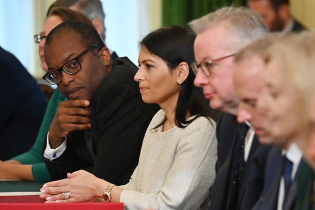 (Left to right) business secretary Kwasi Kwarteng, home secretary Priti Patel, housing secretary Michael...