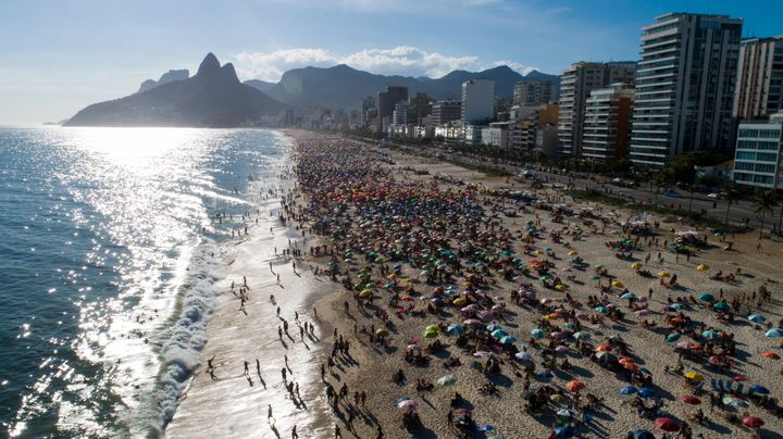 Beachgoers crowd Ipanema beach in Brazil. The country remains on the "red" list.