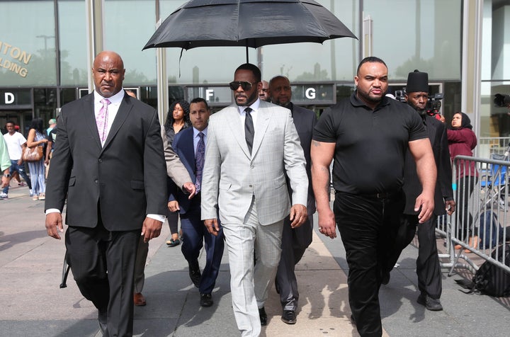 R. Kelly leaves the Criminal Court Building in Chicago after pleading not-guilty during a hearing on 11 new counts of criminal sexual abuse in 2019. 