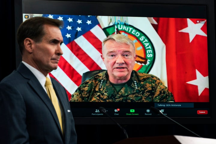 Gen. Frank McKenzie, Commander of U.S. Central Command, appears on screen as he speaks from MacDill Air Force Base, in Tampa, Fla., about Afghanistan during a virtual briefing moderated by Pentagon spokesman John Kirby at the Pentagon in Washington. The Pentagon retreated from its defense of a drone strike that killed multiple civilians in Afghanistan last month, announcing Friday, Sept. 17, that an internal review revealed that only civilians were killed in the attack, not an Islamic State extremist as first believed. (AP Photo/Manuel Balce Ceneta, File)