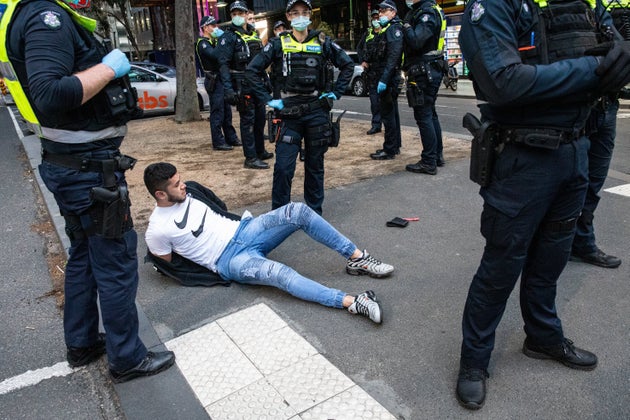 Victoria police arrest a protester during an anti vaccine protest on September