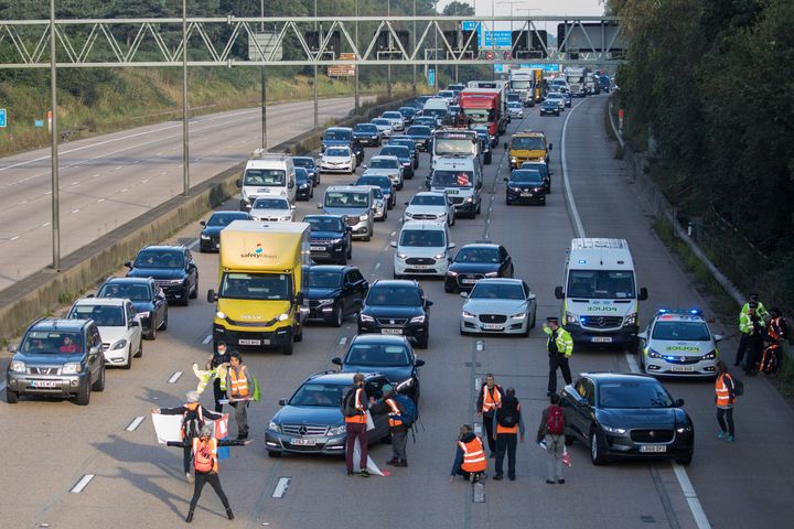Insulate Britain climate activists begin to block the anticlockwise carriageway of the M25 between Junctions 9 and 10 as part of a campaign intended to push the UK government to make significant legislative change to start lowering emissions.