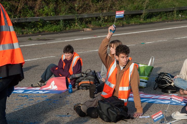 Protestors from Insulate Britain block the M25 motorway near Cobham in Surrey.
