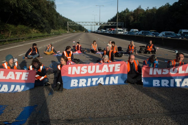 Protestors from Insulate Britain block the M25