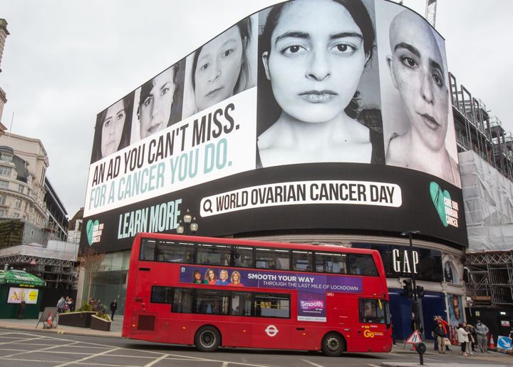 The author, second from left, featured on a billboard in London's Piccadilly Circus on World Ovarian Cancer Day 2021, beside others who share her low-grade serous ovarian cancer diagnosis.