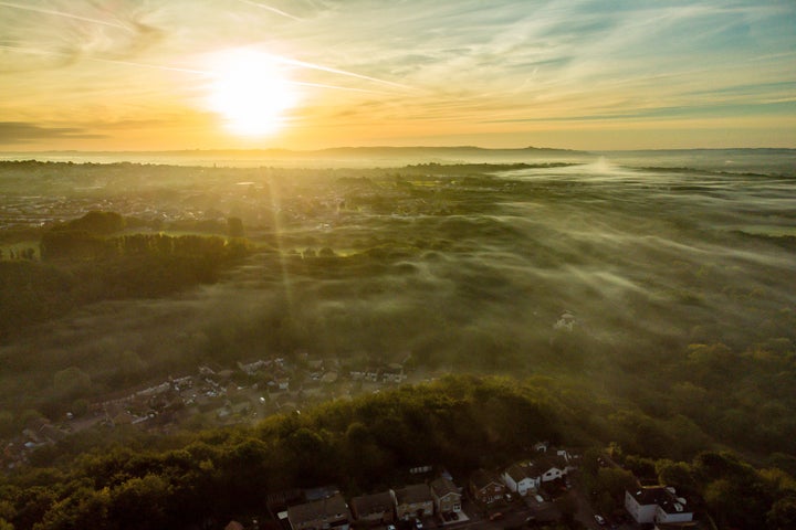 Low mist forms at sunrise over Bristol as the UK leaves summer behind.