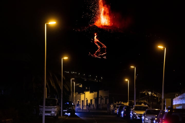 The Cumbre Vieja volcano spews lava and ash in the area of Cabeza de Vaca on Sept. 21, 2021, in La Palma, Canary Islands, Spain.