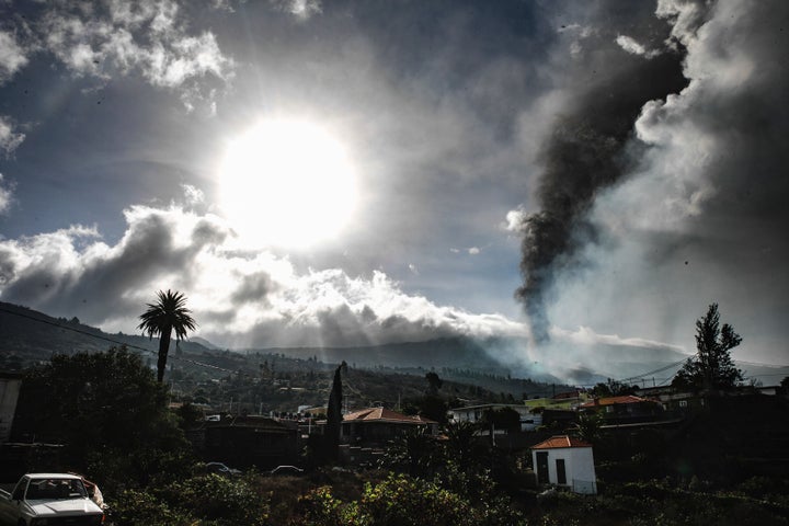 Smoke billows from a volcano near Los Llanos de Ariadne on the island of La Palma in the Canaries, Spain, on Sept. 21, 2021.&