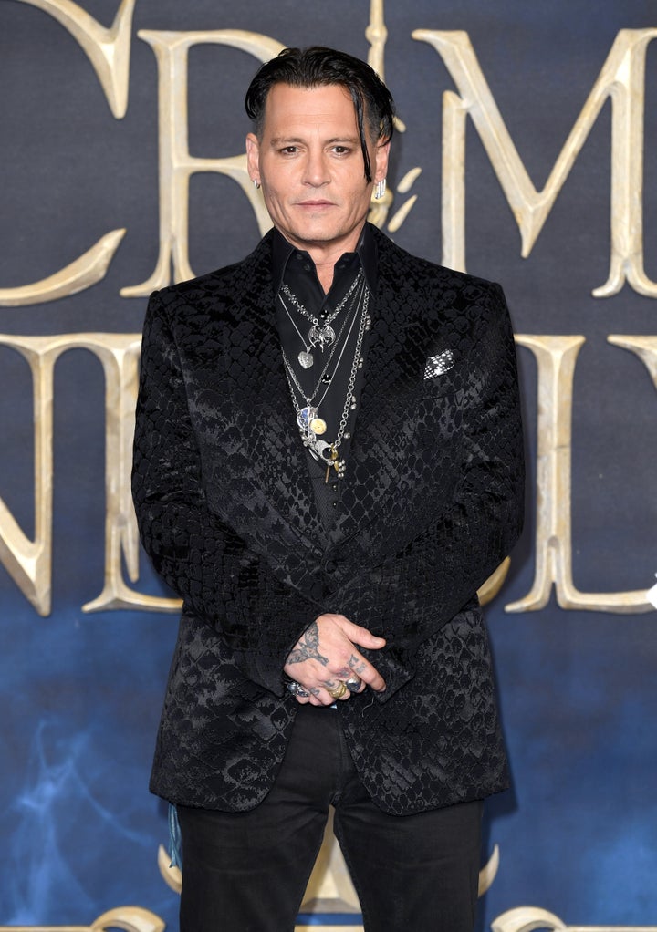 Johnny Depp attends the UK Premiere of "Fantastic Beasts: The Crimes Of Grindelwald."